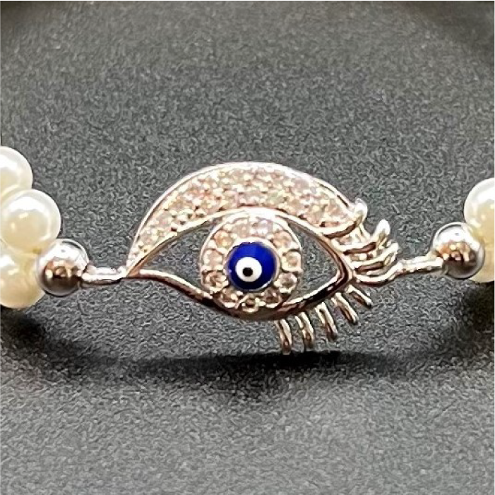 Pulsera de Perlas con Ojo de Cristales